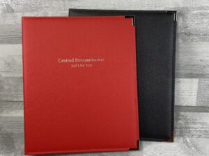 shelly real leather mateiral ring binders in red and black with personalisation in the middle