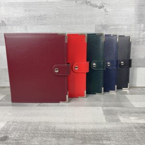 A5 Oatlands bonded leather ring binders. burgundy, red, green, navy, black. with strap and stud closure and round corners